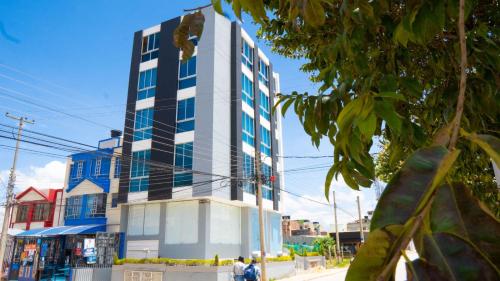 a tall building on the side of a street at Sky Suite in Sogamoso