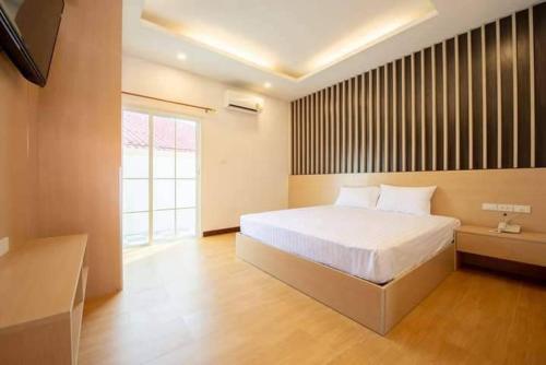 Postel nebo postele na pokoji v ubytování Secret Hotel