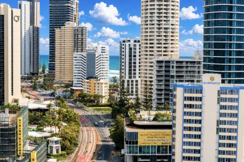 a cityscape of a city with tall buildings at Beachside Studio with Stunning Ocean View in Gold Coast