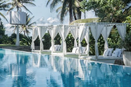 a wedding set up by the pool at a resort at W15 Escape in Ahangama