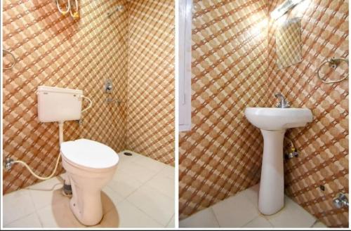 a bathroom with a toilet and a sink at THE PINE STAy in Chail