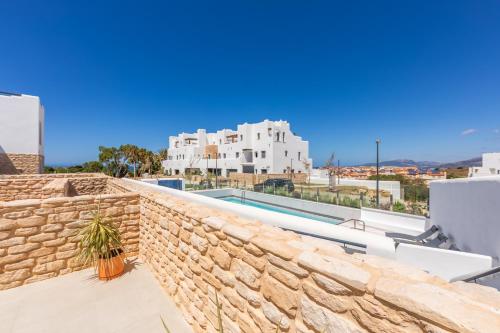 2BR Apt with Terrace & Parking, Near Beach & Town