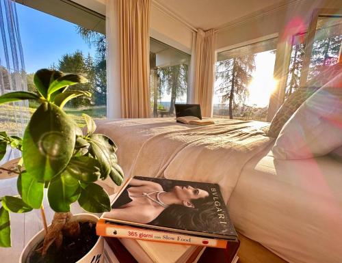 a bedroom with a bed with a laptop on it at ORNI House in Hazlov