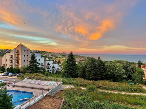 a view of a resort with a swimming pool at SOLITA Apartment with Panoramic View in Byala