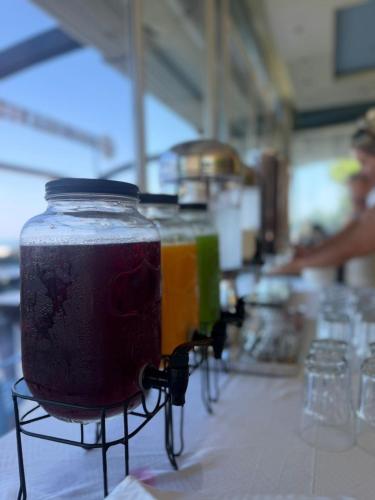 a jar of liquid sitting on top of a table at Hotel Liburnia Vitamin Aga in Golem