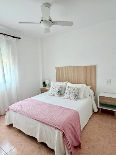 Bajo con jardin privado piscina 250m playa