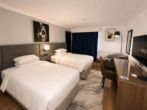 เตียงในห้องที่ Al Mubarakia Hotel Yanbu-EX Radisson Blu
