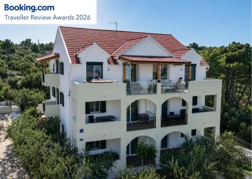 a villa with a view of the ocean at The Good Place in Sutivan