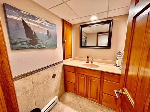 a bathroom with a sink and a mirror at TnTBnB in Combined Locks