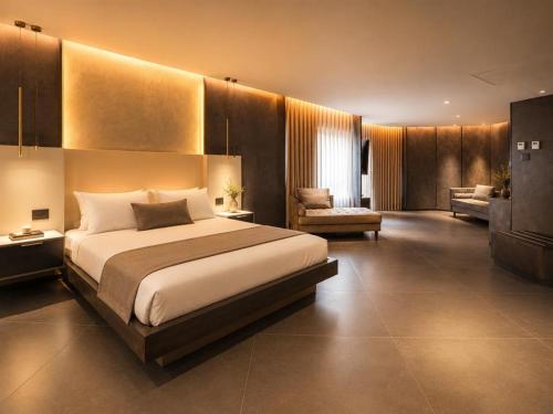 a large bedroom with a large bed and a couch at La Coquille - הקונכייה in Eilat
