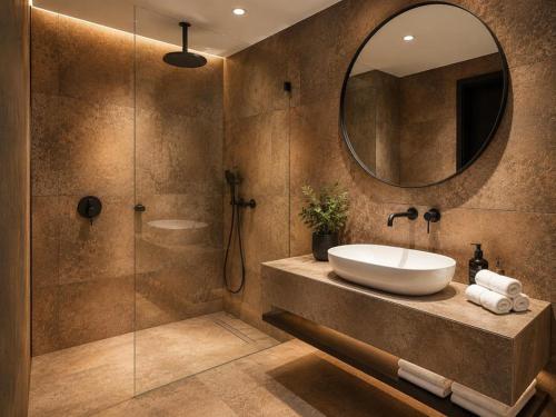 a bathroom with a sink and a mirror at La Coquille - הקונכייה in Eilat