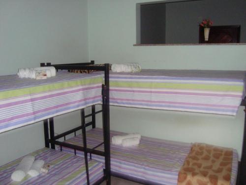 Krevet ili kreveti na kat u jedinici u objektu Apartamento Masculino Compartilhado em Santa Teresa