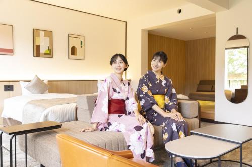 two women in kimonos sitting in a hotel room at TAOYA Hakone in Hakone
