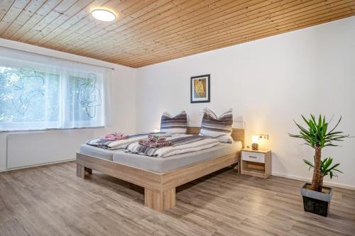 a bedroom with a bed in a room at Carmen in Wald