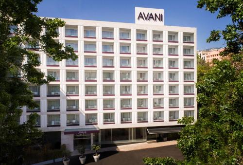 a building with a sign on top of it at Avani Avenida Liberdade Lisbon Hotel in Lisbon