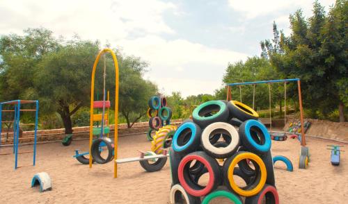 a playground with many different types of playground equipment at Atlas Kasbah in Agadir