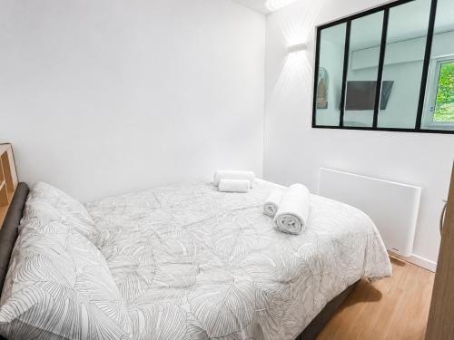 T2 calme, parking privé, proche centre ville
