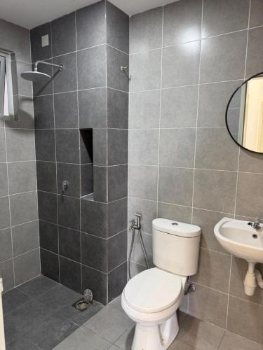 a bathroom with a toilet and a shower and a sink at Sufi Idaman Studio for Islamic only in Nilai