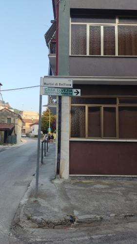 a street sign sitting on the side of a street at Casa Elvezia Guest House in SantʼElpidio a Mare