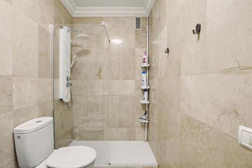 a bathroom with a toilet and a shower at NG CANDELARIA - Tenerife in Candelaria