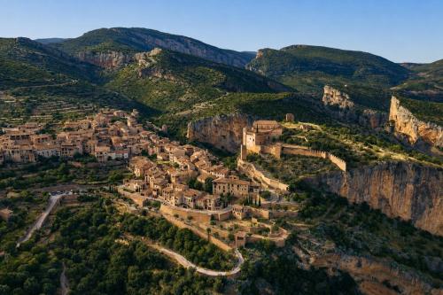 an aerial view of a village on the side of a mountain at Kampaoh Alquézar in Alquézar