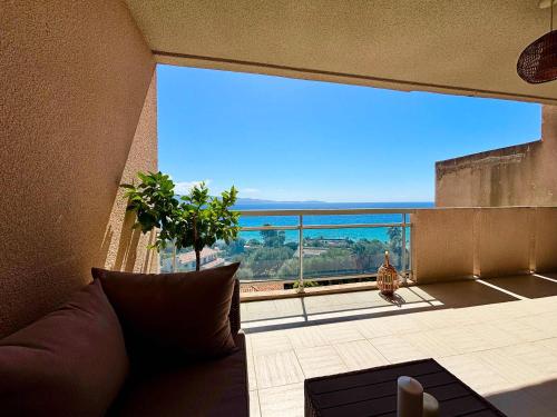 a living room with a large view of the ocean at Casamea - Terrasse Mer, Plage 5min, Barbicaja in Ajaccio