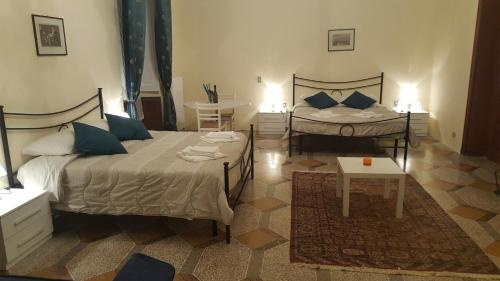 Postel nebo postele na pokoji v ubytování Garden Suite