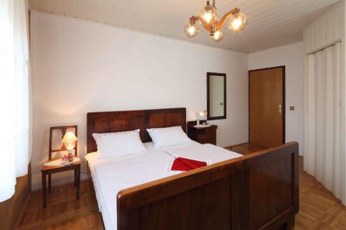 Postel nebo postele na pokoji v ubytování Apartment Šume Pjevaju