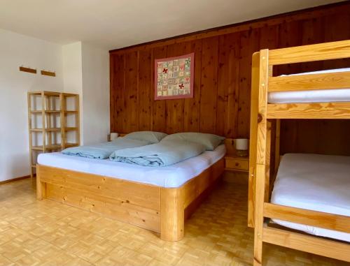 a bedroom with two bunk beds in a house at Villa Zeppelin - App Smaragd in Bramberg am Wildkogel