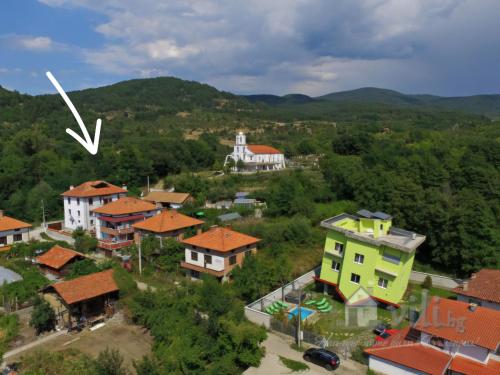 an aerial view of a small town with houses at Guest House Popov in Marchevo
