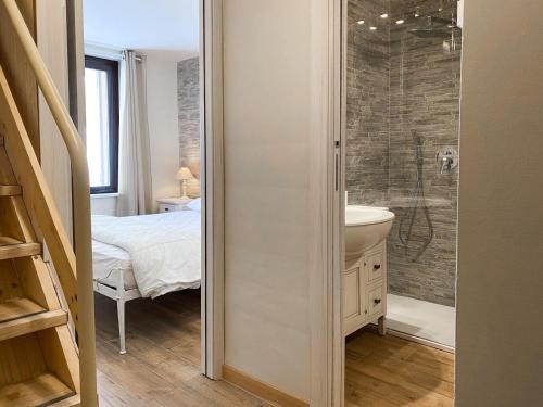 a bathroom with a shower and a sink at Fiocco di Neve - AffittiPontediLegno in Passo del Tonale
