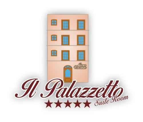 a sign for a restaurant with a building at Il Palazzetto in Gaeta