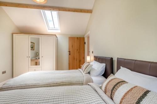 a bedroom with a bed and a skylight at 2 Bed in Laxton oc-p44858 in Laxton