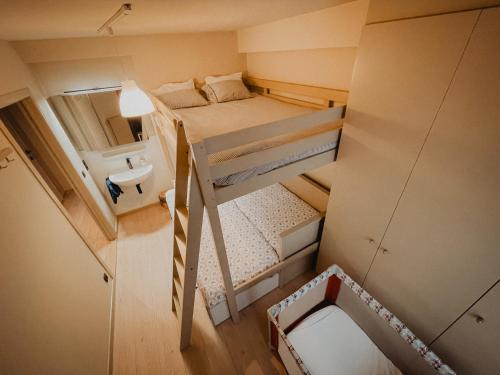 an overhead view of a small room with a bunk bed at Vertry at Sea, Luxury Apartment Knokke in Knokke-Heist