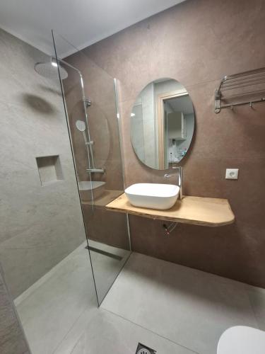 a bathroom with a sink and a mirror at Calm And Nature in Petra