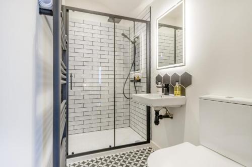 a bathroom with a shower and a sink at 7 Bed in Welshpool oc-96412 in Berriew