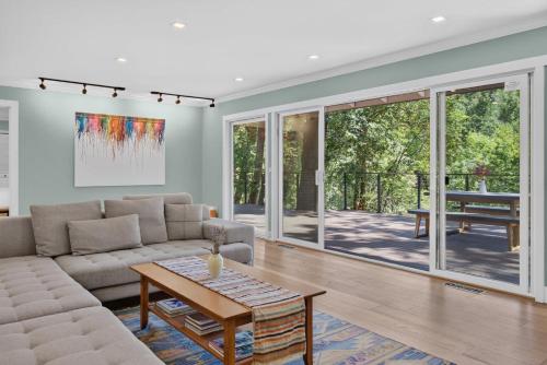 a living room with a couch and a table at The Enso Sonoma in Glen Ellen
