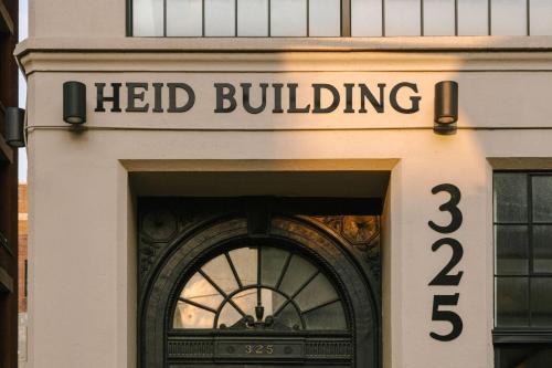 a door with the words held building on it at The Heid Lofts by Reside, a Wyndham Residence in Philadelphia