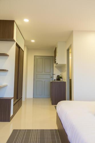 Cama o camas de una habitación en Q Space Residence