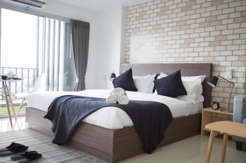 Cama o camas de una habitación en Q Space Residence