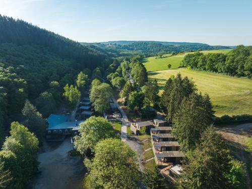 an aerial view of a river with a lodge at Resort Walsdorf in Tandel