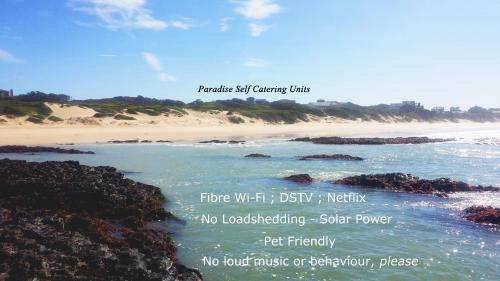 a picture of a beach with the words paradise self catering hire at Paradise Self-Catering Units in Jeffreys Bay