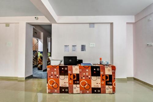 a pile of boxes sitting in a room at Hotel O DOWNTOWN INN in Kolkata