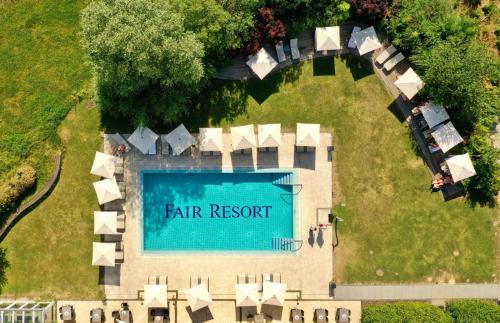 an aerial view of a fair resort with a swimming pool at FAIR RESORT All Inclusive Wellness & Spa Hotel Jena in Jena