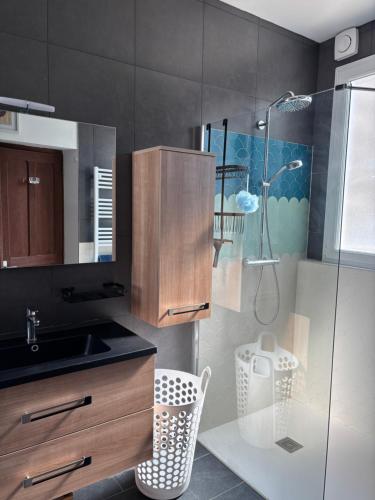 a bathroom with a shower and a sink and a shower at Village vacations in Guarguale