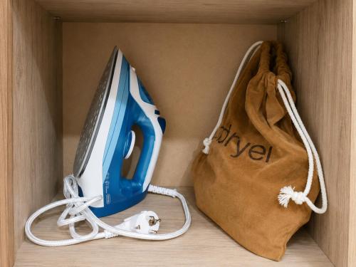 a box with a laptop computer and a bag at Apartment Be Happy 3, Premium Apartment in Ruse City Centre in Ruse
