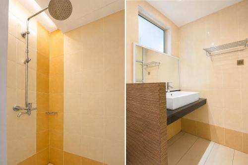 a bathroom with a sink and a mirror at Collection O Near Tanjung Batu Formerly 4orty Inn in Bintulu