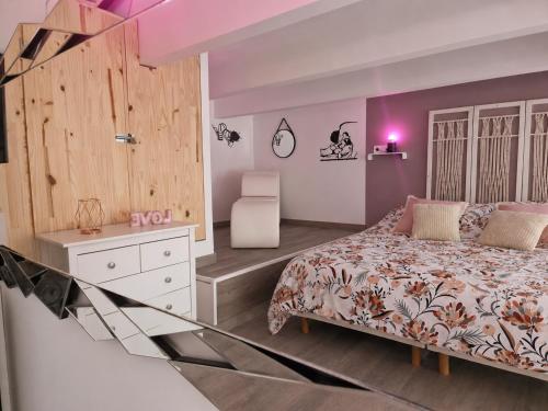 a bedroom with a bed and a glass floor at Le secret show in Saumur