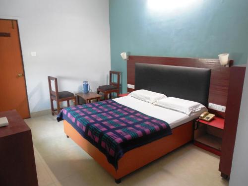 Postel nebo postele na pokoji v ubytování Hotel Silver Springs