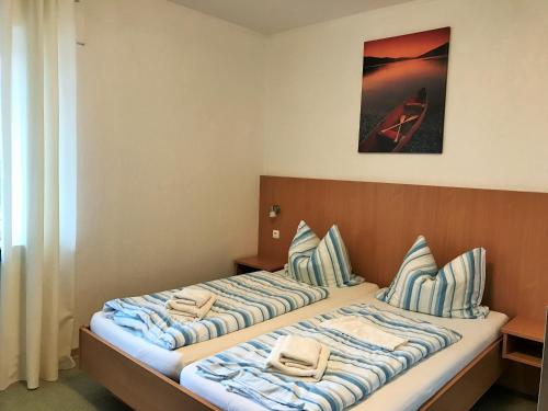Postel nebo postele na pokoji v ubytování Hotel Meyerhoff